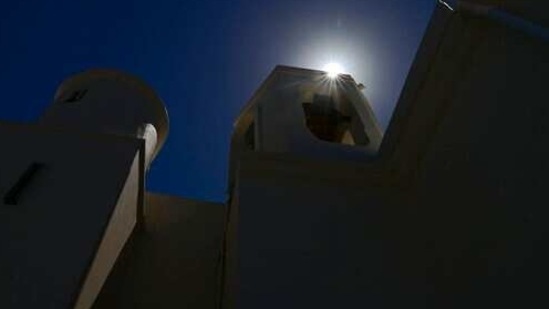 The midday sun rises over the facade of the second oldest Spanish church in the Americas, the San Jose Church, that will reopen following a massive reconstruction that took nearly two decades to complete, in San Juan, Puerto Rico, Tuesday, March 9, 2021. The church was built for a Dominican convent, served as a shelter during an attack by the Indigenous Taínos, became Puerto Rico’s first high school and was damaged by a cannonball during the 1898 Spanish-American War in which Spain ceded Puerto Rico to the U.S.(AP)