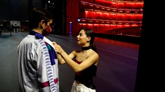 Elpida Skourou, right, speaks with George Hatzopoulos, both dancers of the Greek National Opera Ballet before a rehearsal of "Despo-Greek Dances" Opera and dance performance in Athens, Friday, Feb. 26, 2021. (AP)