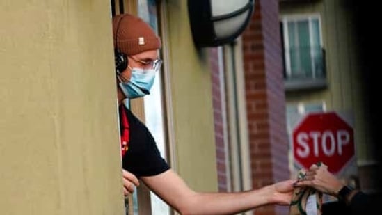 Tens of millions of people lost their jobs after US states closed or restricted businesses as the pandemic intensified in March 2020. Among those who stayed employed, the division between those who could work from home and those who couldn't became one of the first of many inequalities widened by the pandemic. (AP) Tens of millions of people lost their jobs after US states closed or restricted businesses as the pandemic intensified in March 2020. Among those who stayed employed, the division between those who could work from home and those who couldn't became one of the first of many inequalities widened by the pandemic. (AP)