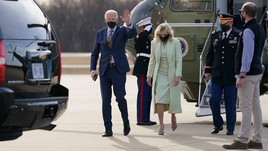 President Joe Biden and first lady Jill Biden walk to a motorcade vehicle after stepping off Marine One at Delaware Air National Guard Base in New Castle, Delaware. (AP Photo ) President Joe Biden and first lady Jill Biden walk to a motorcade vehicle after stepping off Marine One at Delaware Air National Guard Base in New Castle, Delaware. (AP Photo )