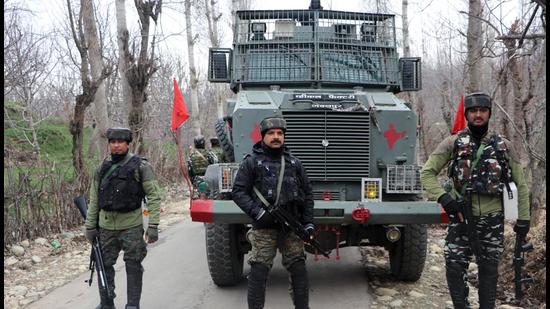 Army personnel stand guard at the encounter site, at Rawalpora, in Shopian on Sunday. (ANI) Army personnel stand guard at the encounter site, at Rawalpora, in Shopian on Sunday. (ANI)