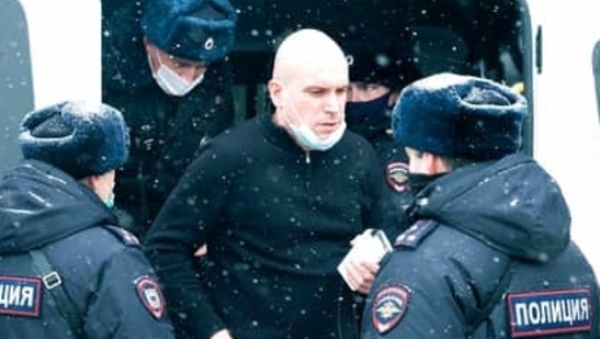 A man stands near a police bus after he was detained in Moscow, Russia, Saturday, March 13, 2021. Russian police on Saturday detained about 150 participants of a forum of independent members of municipal councils, an action that comes amid the authorities' multi-pronged crackdown on dissent. Police showed up at the gathering in Moscow shortly after it opened, saying that all those present will be detained for taking part in an event organized by an "undesirable" organization. (AP Photo/Victor Berezkin)(AP) A man stands near a police bus after he was detained in Moscow, Russia, Saturday, March 13, 2021. Russian police on Saturday detained about 150 participants of a forum of independent members of municipal councils, an action that comes amid the authorities' multi-pronged crackdown on dissent. Police showed up at the gathering in Moscow shortly after it opened, saying that all those present will be detained for taking part in an event organized by an "undesirable" organization. (AP Photo/Victor Berezkin)(AP)