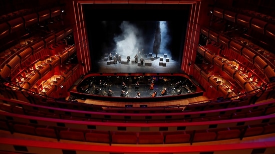 Singers and orchestra of the Greek National Opera perform during the video recording of "Despo-Greek Dances" Opera and dance performance in Athens, Saturday, March 6, 2021. (AP)