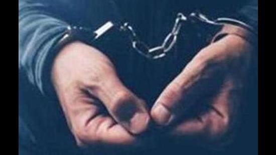 Arrested computer hacker and cyber criminal with handcuffs, close up of hands (Getty Images/iStockphoto) Arrested computer hacker and cyber criminal with handcuffs, close up of hands (Getty Images/iStockphoto)