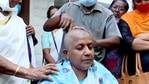 Kerala Mahila Congress Chief Lathika Subhash gets her head tonsured in front of the party office after being denied the party ticket for the assembly election, in Thiruvananthapuram on Sunday. (ANI Photo) Kerala Mahila Congress Chief Lathika Subhash gets her head tonsured in front of the party office after being denied the party ticket for the assembly election, in Thiruvananthapuram on Sunday. (ANI Photo)