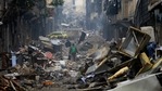 In this Jan. 20, 2017 file photo, residents walk through the destruction of the once rebel-held Salaheddine neighbourhood in eastern Aleppo, Syria. (AP Photo/Hassan Ammar, File) In this Jan. 20, 2017 file photo, residents walk through the destruction of the once rebel-held Salaheddine neighbourhood in eastern Aleppo, Syria. (AP Photo/Hassan Ammar, File)
