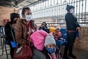 Migrant families wait for their bus at a bus station in Brownsville, Texas before travelling to meet relatives or sponsors. (AFP) Migrant families wait for their bus at a bus station in Brownsville, Texas before travelling to meet relatives or sponsors. (AFP)