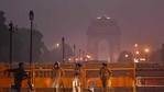 A person using an electric scooter inquires from police personnel manning barricades on Rajpath near India Gate in New Delhi on Saturday, December 12, 2020.(Sanchit Khanna/HT PHOTO) A person using an electric scooter inquires from police personnel manning barricades on Rajpath near India Gate in New Delhi on Saturday, December 12, 2020.(Sanchit Khanna/HT PHOTO)