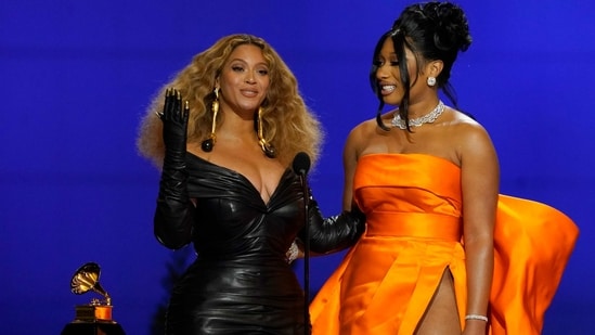 Beyonce (L) and Megan Thee Stallion accepting the award for best rap song for 