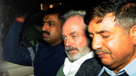 In this file picture from 2018, James Christian Michel (C) the alleged middleman in the multi-crore AgustaWestland chopper deal, being produced at a Central Bureau of Investigation (CBI) Court, in Patiala House Court, in New Delhi. (HT Photo)