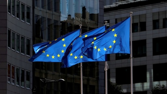 European Union flags flutter outside the European Commission headquarters in Brussels, Belgium.(Reuters)
