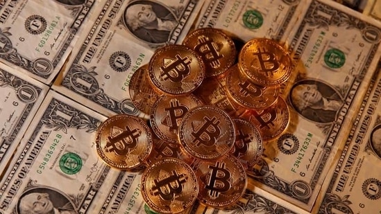 The fortunes of a range of companies are increasingly tied to the cryptocurrency, from listed Bitcoin miners and brokers to firms that have invested in the token.(REUTERS)