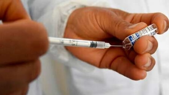 A health worker loads a syringe with a shot of the Sputnik-V Covid-19 vaccine. (AP) A health worker loads a syringe with a shot of the Sputnik-V Covid-19 vaccine. (AP)