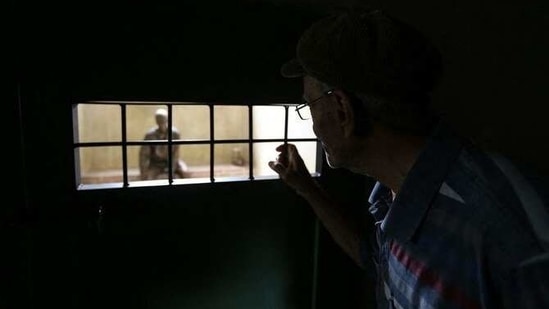 A file photo showing a tourist visiting the "Qasr prison", a former prison hosting political prisoners that was turned into a museum in 2012.(AFP)
