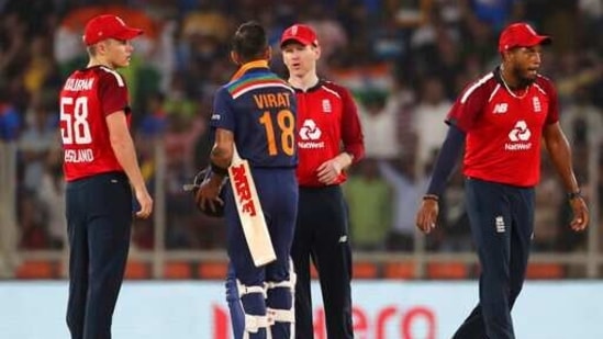 India's captain Virat Kohli shakes hands with England's captain Eoin Morgan after their win in the second T20I(AP)