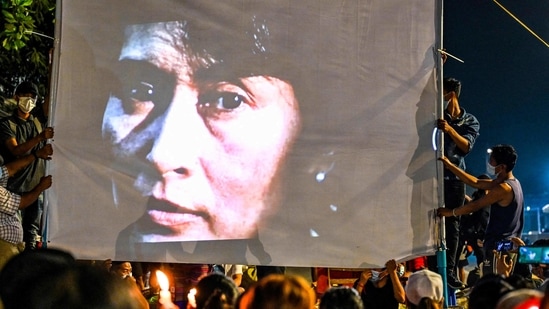 An image of detained civilian leader Aung San Suu Kyi is projected on a screen during a night-time demonstration by protesters against the military coup in Yangon on March 13, 2021. (AFP) An image of detained civilian leader Aung San Suu Kyi is projected on a screen during a night-time demonstration by protesters against the military coup in Yangon on March 13, 2021. (AFP)