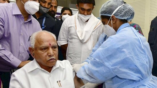 Yediyurappa requested citizens to wear masks and maintain social distancing at public places to balance economic activities and to avoid any further lockdown. In picture - BS Yediyurappa takes his first dose of Covid-19 vaccine,(PTI)