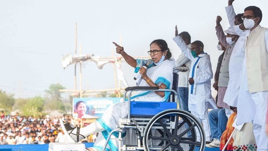 West Bengal Chief Minister Mamata Banerjee addresses a public rally in Purulia district while sitting on a wheelchair on Monday. (PTI)