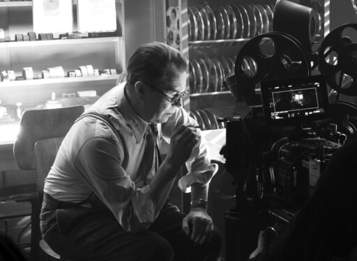 In this image released by Netflix, Gary Oldman portrays Herman Mankiewicz in a scene from "Mank," named one of the top 10 films of the year by The American Film Institute. (Nikolai Loveikis/Netflix via AP)(AP) In this image released by Netflix, Gary Oldman portrays Herman Mankiewicz in a scene from "Mank," named one of the top 10 films of the year by The American Film Institute. (Nikolai Loveikis/Netflix via AP)(AP)