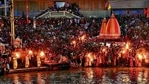 Devotees attend evening prayers after taking a holy dip in the waters of the River Ganges on the Shahi Snan (grand bath) on the occasion of the Maha Shivratri festival during the ongoing Kumbh Mela festival in Haridwar on March 11, 2021(AFP) Devotees attend evening prayers after taking a holy dip in the waters of the River Ganges on the Shahi Snan (grand bath) on the occasion of the Maha Shivratri festival during the ongoing Kumbh Mela festival in Haridwar on March 11, 2021(AFP)