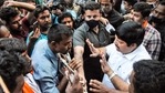BJP Lok Sabha MP Arjun Singh (R) talks with party workers protesting against party's National Vice President Mukul Roy over selection of candidates for the upcoming West Bengal assembly polls, outside BJP election office in Kolkata. (PTI Photo) BJP Lok Sabha MP Arjun Singh (R) talks with party workers protesting against party's National Vice President Mukul Roy over selection of candidates for the upcoming West Bengal assembly polls, outside BJP election office in Kolkata. (PTI Photo)