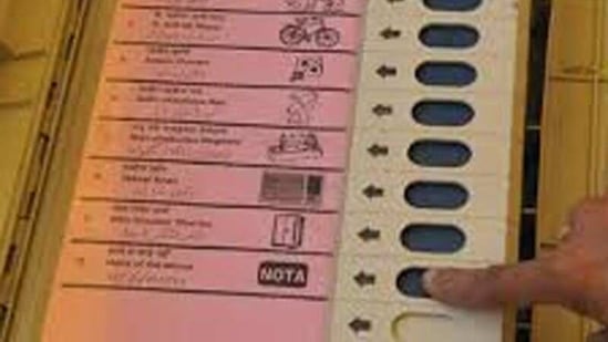 A man presses NOTA button on a EVM machine(HT Archive/For Representative Purposes Only) A man presses NOTA button on a EVM machine(HT Archive/For Representative Purposes Only)