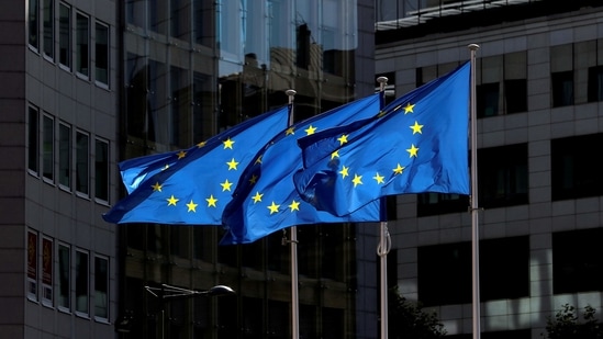 European Union flags flutter outside the European Commission headquarters in Brussels, Belgium.(Reuters)