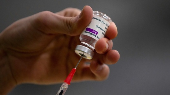 A pharmacist prepares a syringe from a vial of the AstraZeneca coronavirus vaccine during preparations at the Vaccine Village in Antwerp, Belgium. (AP) A pharmacist prepares a syringe from a vial of the AstraZeneca coronavirus vaccine during preparations at the Vaccine Village in Antwerp, Belgium. (AP)