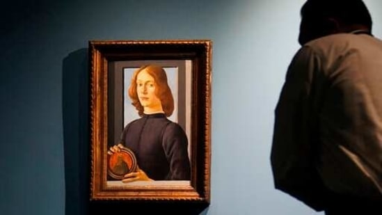 FILE — In this Sept. 23, 2020, file photo, Sandro Botticelli's 15th-century painting called "Young Man Holding a Roundel" is displayed at Sotheby's, in New York. The small painting sold at Sotheby's in New York on Thursday, Jan, 28, 2021, for $92.2 million, an auction record for the Renaissance master. (AP) FILE — In this Sept. 23, 2020, file photo, Sandro Botticelli's 15th-century painting called "Young Man Holding a Roundel" is displayed at Sotheby's, in New York. The small painting sold at Sotheby's in New York on Thursday, Jan, 28, 2021, for $92.2 million, an auction record for the Renaissance master. (AP)