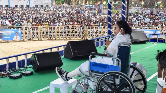 West Bengal CM and TMC supremo Mamata Banerjee addresses an election campaign rally from a wheelchair in Bankura on Tuesday. (PTI)