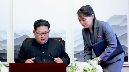 In this file photo taken on April 27, 2018, North Korea's leader Kim Jong Un (L) signs the guest book next to his sister Kim Yo Jong (R) during the Inter-Korean summit at the Peace House building on South Korea's side of the truce village of Panmunjom. (STR / Korea Summit Press Pool / AFP) In this file photo taken on April 27, 2018, North Korea's leader Kim Jong Un (L) signs the guest book next to his sister Kim Yo Jong (R) during the Inter-Korean summit at the Peace House building on South Korea's side of the truce village of Panmunjom. (STR / Korea Summit Press Pool / AFP)