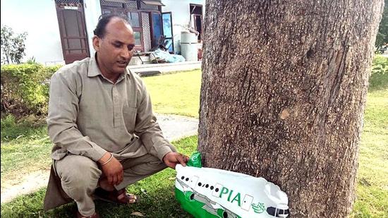 An aircraft-shaped balloon with 'PIA' written on it recovered at Bhalwal in Jammu on Tuesday. (ANI) An aircraft-shaped balloon with 'PIA' written on it recovered at Bhalwal in Jammu on Tuesday. (ANI)