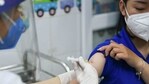 A woman receives a vaccine as Vietnam starts its official rollout of AstraZeneca's coronavirus disease (COVID-19) vaccine for health workers, at Hai Duong Hospital for Tropical Diseases, Hai Duong province, Vietnam, March 8, 2021. (REUTERS)