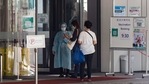 People show their appointment details to a staff while entering a community vaccination center administering the BioNTech Covid-19 vaccine imported by Fosun Pharma in Hong Kong, China.(Bloomberg) People show their appointment details to a staff while entering a community vaccination center administering the BioNTech Covid-19 vaccine imported by Fosun Pharma in Hong Kong, China.(Bloomberg)
