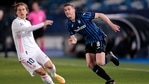 Atalanta's Robin Gosens fights for the ball against Real Madrid's Luka Modric during the Champions League, round of 16, second leg soccer match between Atalanta and Real Madrid at the Alfredo di Stefano stadium in Madrid, Spain, Tuesday, March 16, 2021.(AP) Atalanta's Robin Gosens fights for the ball against Real Madrid's Luka Modric during the Champions League, round of 16, second leg soccer match between Atalanta and Real Madrid at the Alfredo di Stefano stadium in Madrid, Spain, Tuesday, March 16, 2021.(AP)
