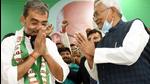 Patna-March.14,2021-Bihar Chief Minister Nitish Kumar felicitates to RLSP president Upendra Kushwaha after the party merged with JDU during Milan Samaroh at JDU office in Patna. Bihar India on Sunday March 14,2021.(Photo by Santosh Kumar /Hindustan Times) Patna-March.14,2021-Bihar Chief Minister Nitish Kumar felicitates to RLSP president Upendra Kushwaha after the party merged with JDU during Milan Samaroh at JDU office in Patna. Bihar India on Sunday March 14,2021.(Photo by Santosh Kumar /Hindustan Times)