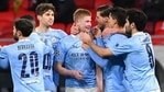 Kevin De Bruyne of Manchester City, centre, celebrates with teammates after scoring a goal against Borussia Moenchengladbach during the Champions League round of 16 second leg soccer match between Manchester City and Borussia Moenchengladbach in the Puskas Ferenc Arena in Budapest, Hungary, Tuesday, March 16, 2021.(AP) Kevin De Bruyne of Manchester City, centre, celebrates with teammates after scoring a goal against Borussia Moenchengladbach during the Champions League round of 16 second leg soccer match between Manchester City and Borussia Moenchengladbach in the Puskas Ferenc Arena in Budapest, Hungary, Tuesday, March 16, 2021.(AP)