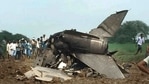 Wreckage of the Indian Air Force MiG-21 Bison fighter jet lies in a field after the crash in Gwalior. Group Captain A Gupta lost his life in the tragic accident. (PTI Photo)