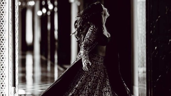 In one of the photographs Sara can be seen wearing a heavily embellished lehenga and sherwani with a plain cropped blouse as she twirled around the corridors of the Leela Palace.(Instagram)