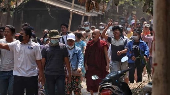 Anti-coup demonstrators march in Nyaung-U, Myanmar March 17, 2021. (Reuters)