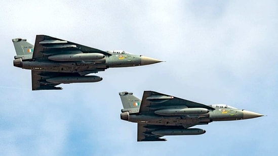 LCA Tejas flying during the air show on day-two of Aero India 2021 at Air Force Station, Yelahanka, in Bengaluru. (ANI Photo)
