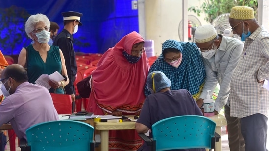 Senior citizens at a help desk during a Covid-19 vaccination drive at Saifee Hospital, Marine Lines in Mumbai, on March 16. Dr Pradeep Awate, state surveillance officer, told HT that the state has been witnessing the second wave and the cases are likely to cross the peak witnessed during the first wave.(Anshuman Poyrekar / HT Photo)