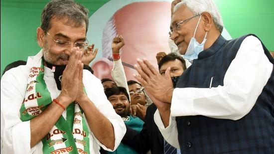 Patna-March.14,2021-Bihar Chief Minister Nitish Kumar felicitates to RLSP president Upendra Kushwaha after the party merged with JDU during Milan Samaroh at JDU office in Patna. Bihar India on Sunday March 14,2021.(Photo by Santosh Kumar /Hindustan Times) Patna-March.14,2021-Bihar Chief Minister Nitish Kumar felicitates to RLSP president Upendra Kushwaha after the party merged with JDU during Milan Samaroh at JDU office in Patna. Bihar India on Sunday March 14,2021.(Photo by Santosh Kumar /Hindustan Times)