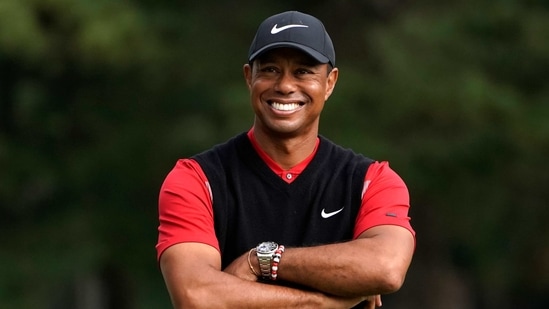 Tiger Woods smiles in a file photo (AP) Tiger Woods smiles in a file photo (AP)