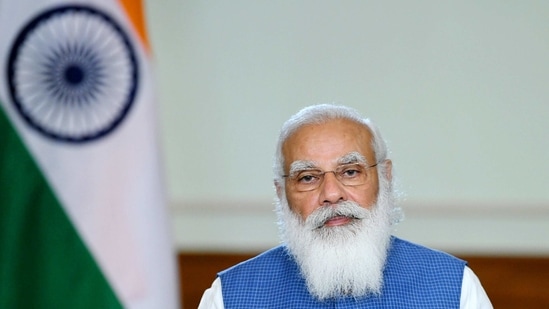 Prime Minister Narendra Modi suggested bringing focus back on the test-trace-treat strategy by ensuring at least 70% of tests are through the RT-PCR method among other strategies to curb spread of Covid-19. (PTI Photo)