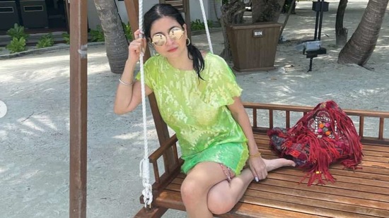 Maheep Kapoor resting at the beach.