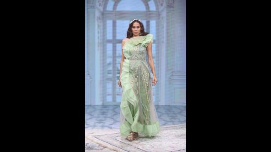 A model in a pastel embellished creation from Geisha Designs by Paras and Shalini (Photo: Instagram/FDCIOfficial) A model in a pastel embellished creation from Geisha Designs by Paras and Shalini (Photo: Instagram/FDCIOfficial)