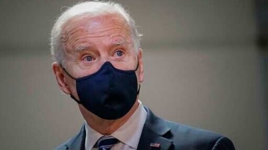 President Joe Biden looks on during his visit to Smith Flooring, Inc., Tuesday March 16, 2021, in Chester, Pa. President Biden says New York Gov. Andrew Cuomo should resign if the state attorney general's investigation confirms the sexual harassment allegations against him. (AP Photo/Carolyn Kaster) (AP) President Joe Biden looks on during his visit to Smith Flooring, Inc., Tuesday March 16, 2021, in Chester, Pa. President Biden says New York Gov. Andrew Cuomo should resign if the state attorney general's investigation confirms the sexual harassment allegations against him. (AP Photo/Carolyn Kaster) (AP)