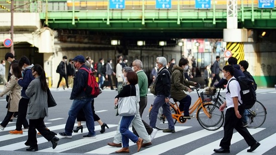 "The Chinese economy will resume recovery once a renewed rise in infections fades, and the vaccine rollouts and huge stimulus will give a boost to the US economy, all of which should help accelerate Japan's exports and broader economy in April-June."(AP) "The Chinese economy will resume recovery once a renewed rise in infections fades, and the vaccine rollouts and huge stimulus will give a boost to the US economy, all of which should help accelerate Japan's exports and broader economy in April-June."(AP)