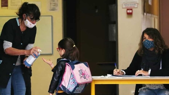 Groups representing US doctors, teachers and top school officials on Friday pushed back against pressure from President Donald Trump to fully reopen US schools, saying science must guide the decisions.(AP) Groups representing US doctors, teachers and top school officials on Friday pushed back against pressure from President Donald Trump to fully reopen US schools, saying science must guide the decisions.(AP)